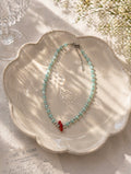Turquoise-Inspired Beaded Necklace with Red Floral